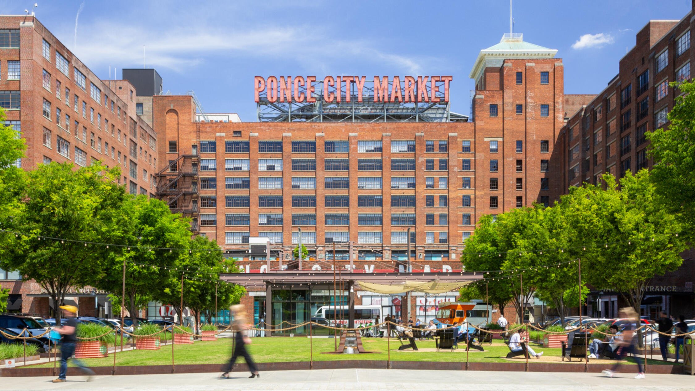 Ponce City Market's exterior façade with visitors in foreground