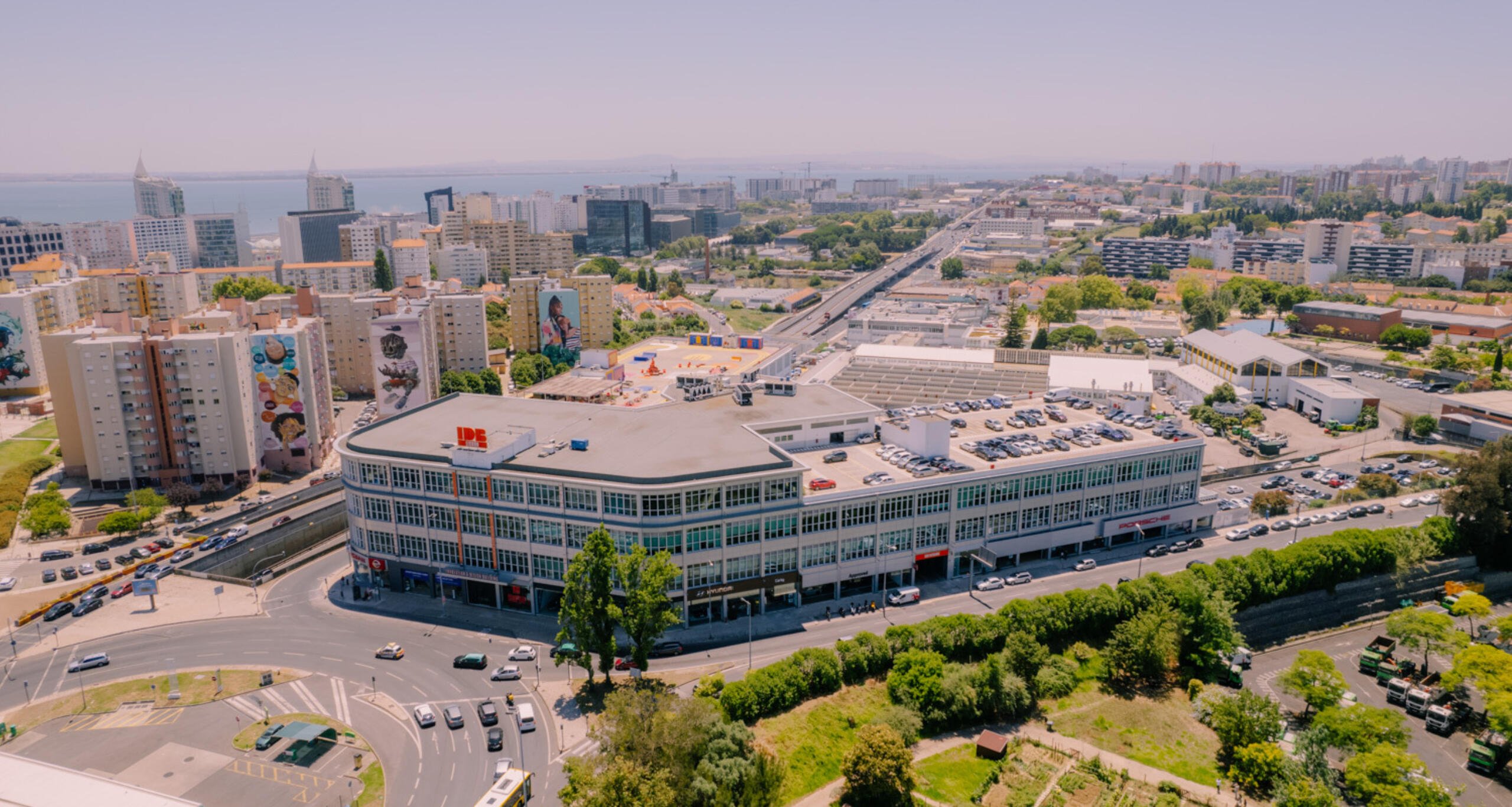 Aerial view of IDB Lisbon building with cityscape in background