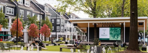 Birkdale Village outdoor courtyard with expansive water fountain and buildings and a pavilion in the background